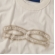 Camiseta QC - Arqueólogos Boxy - Off-white